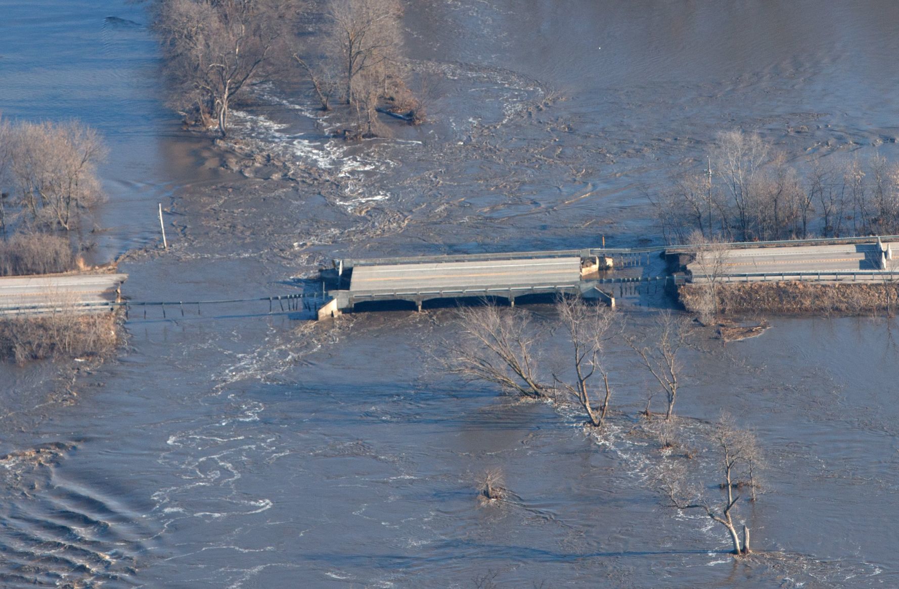A portion of Highway 92 has been destroyed by floodwaters in western Douglas County.